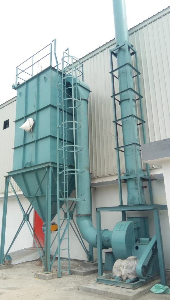 Dust collection baghouse fabricated by RG Steel Crafts, installed on site with ducting and fan
